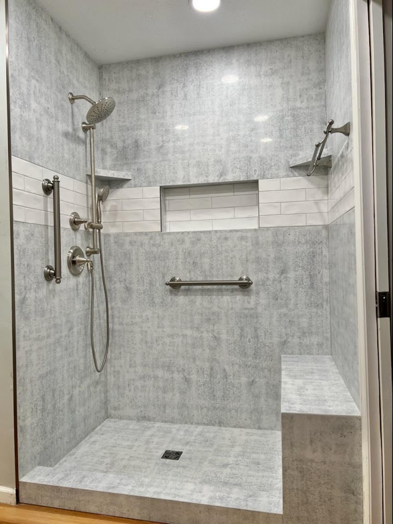 Walk-in shower stone wall panels